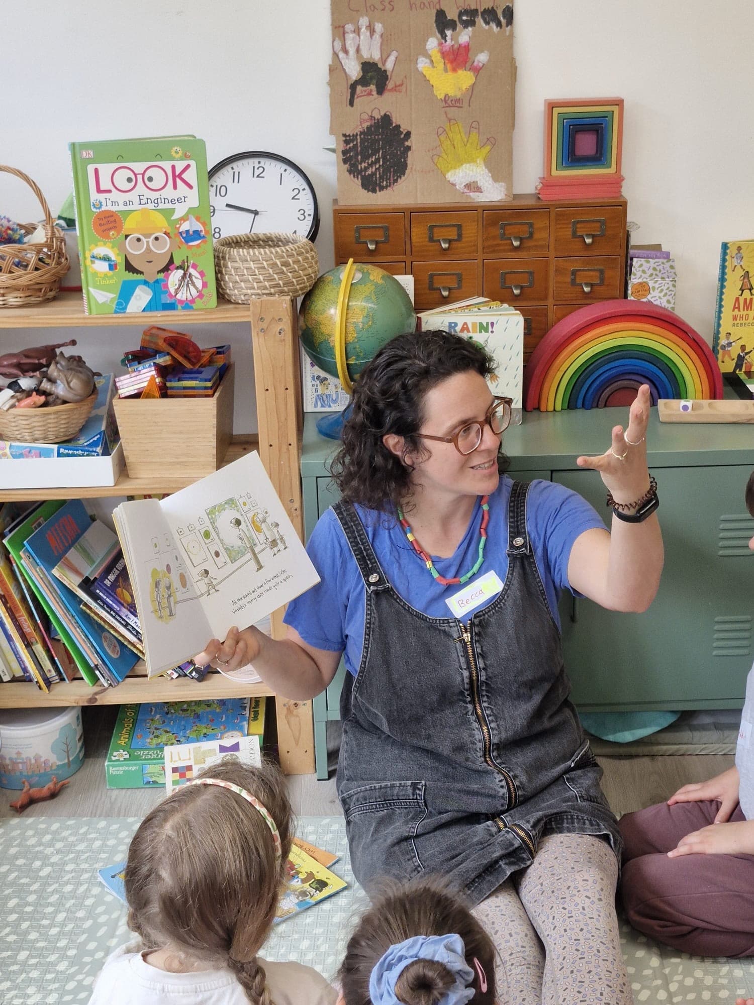 Becca running a workshop with children